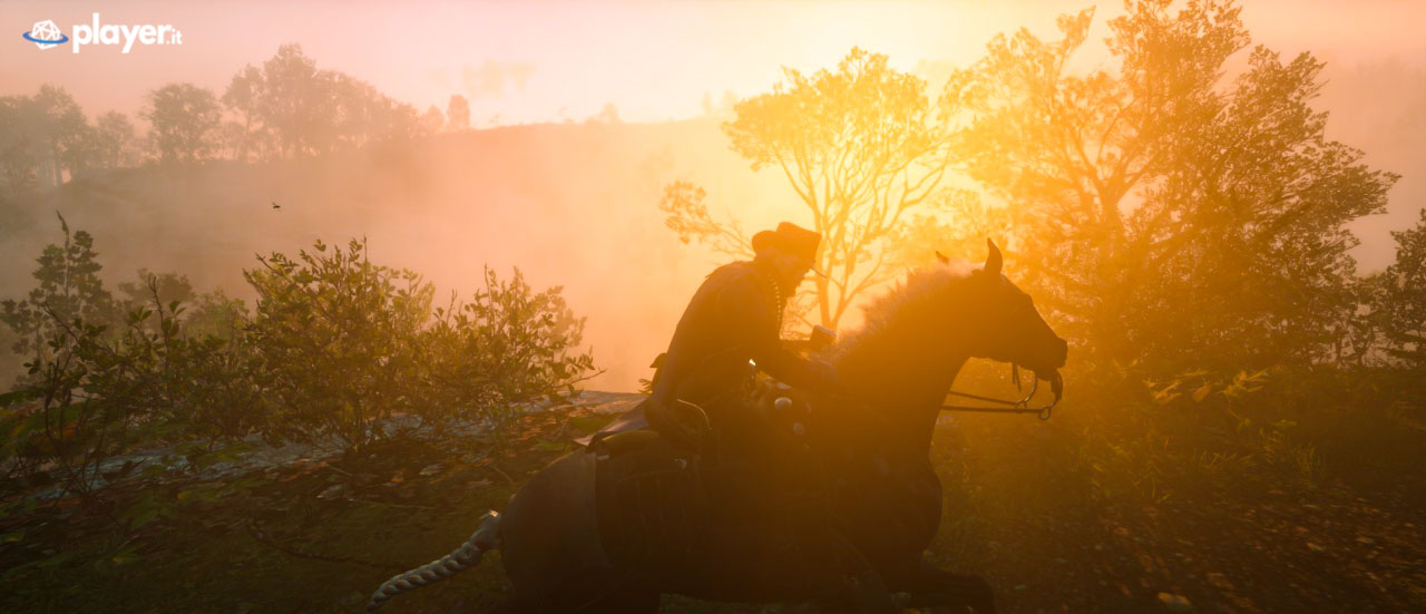 Red Dead Redemption II cavalcata durante il tramonto