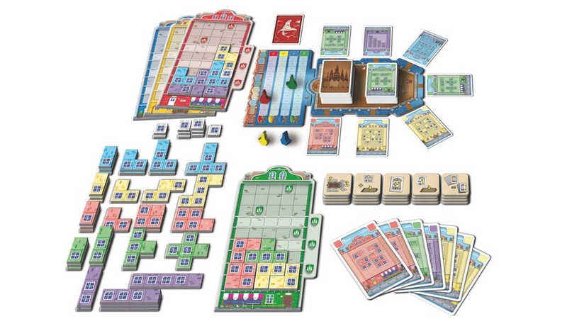 I compnenti di copenhagen, con la plancia della città con le carte dei vari colori, i segnapunti a forma di canale, i polimini di diverse misure e colori e la plancia palazzo