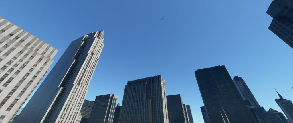 Microsoft Flight Simulator: vista dal basso dell'aereo che vola su New York