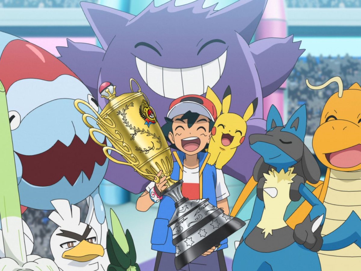 Ash alza la coppa del mondo insieme alla sua squadra di Pokémon