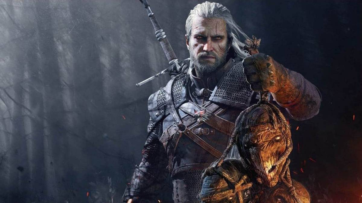 Geralt tiene la testa di un mostro legato. 