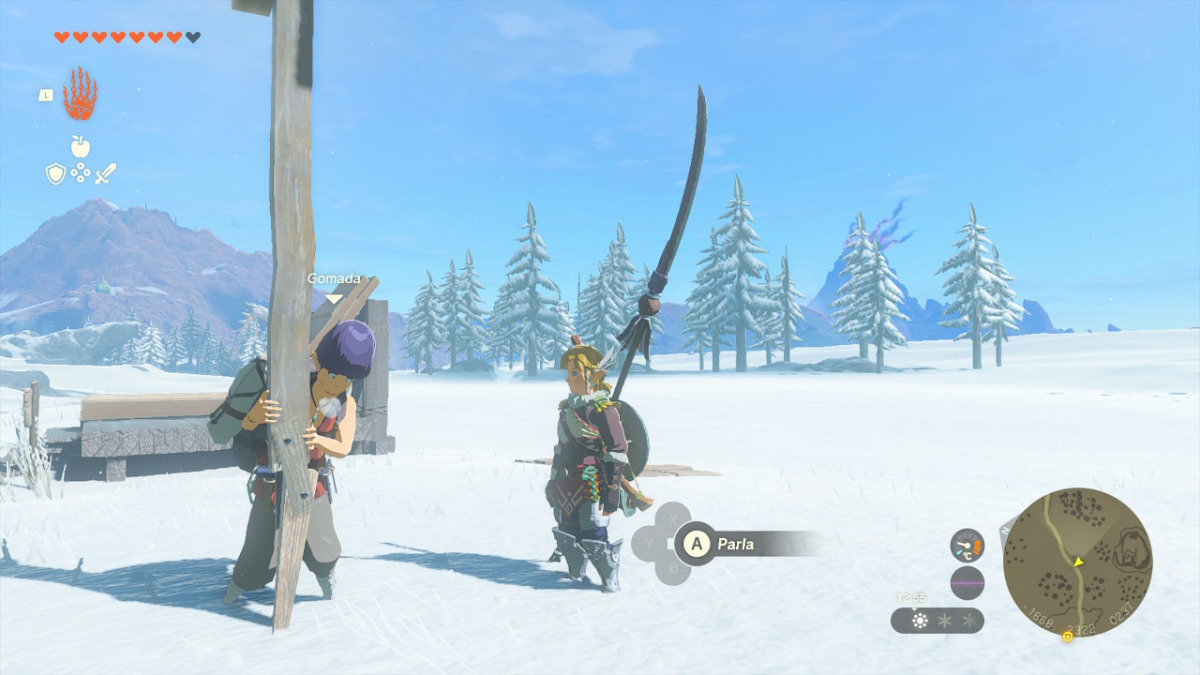 Link vicino Gomada che sorregge un cartello di Miceda in un paesaggio innevato di The Legend of Zelda: Tears of the Kingdom.