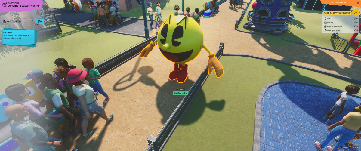 Animatore con impossibiliazione indossa il costume di Pac-Man in Park Beyond