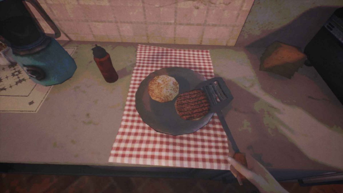 Impiattamento di un hamburger in While We Wait Here