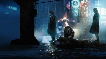 Due poliziotti chini su un cadavere di notte sotto la pioggia