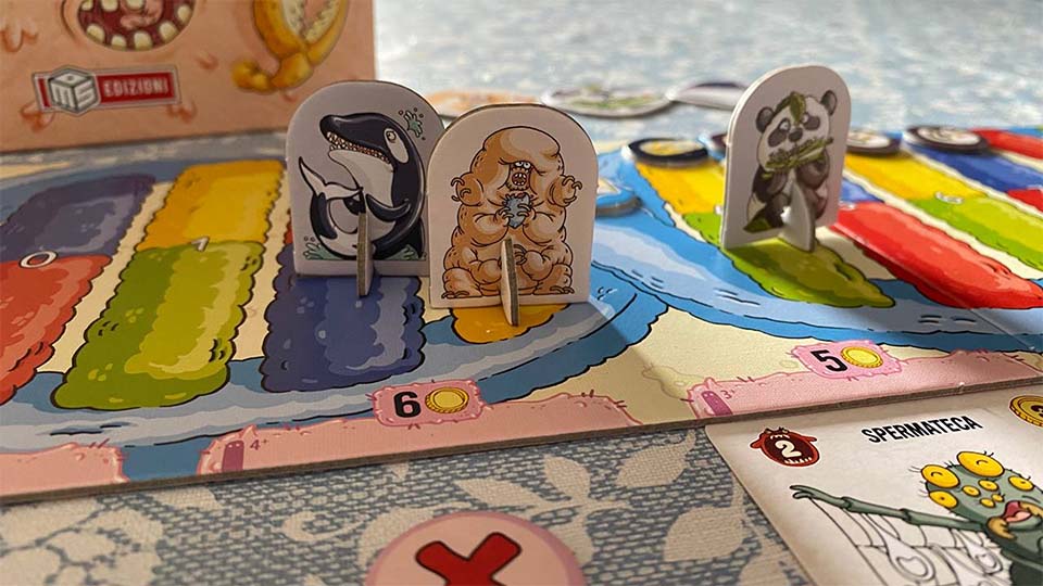 Tracciato di Evolversi Male con pedine dei giocatori