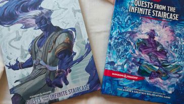 I due manuali con le copertine. In una c'è il genio Nasaf e in quella standard gli avventurieri sulle scale infinite