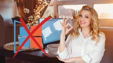 donna che fa il gesto ok con accanto il logo di windows con una crocetta rossa sopra e sullo sfondo un soggiorno con un pc portatile