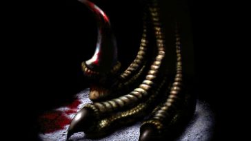 key art di Dino Crisis con la tipica zampa del dinosauro su sfondo nero