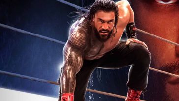 Roman Reigns inginocchiato sul ring, in posa per la copertina di WWE 2K25