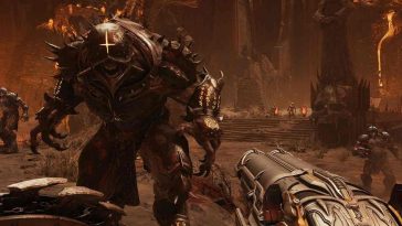 screenshot di Doom: The Dark Ages con protagonista che punta l'arma contro un nemico
