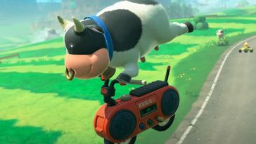 personaggio mucca mario kart che impenna sulla moto