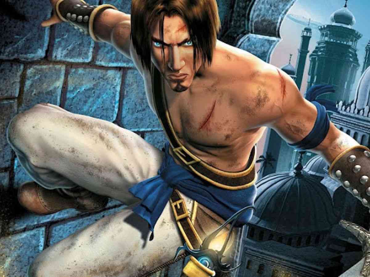 key art di prince of persia le sabbie del tempo remake con protagonista appeso alla parete