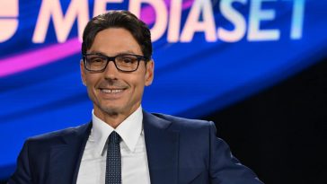 Piersilvio Berlusconi e il logo di Mediaset