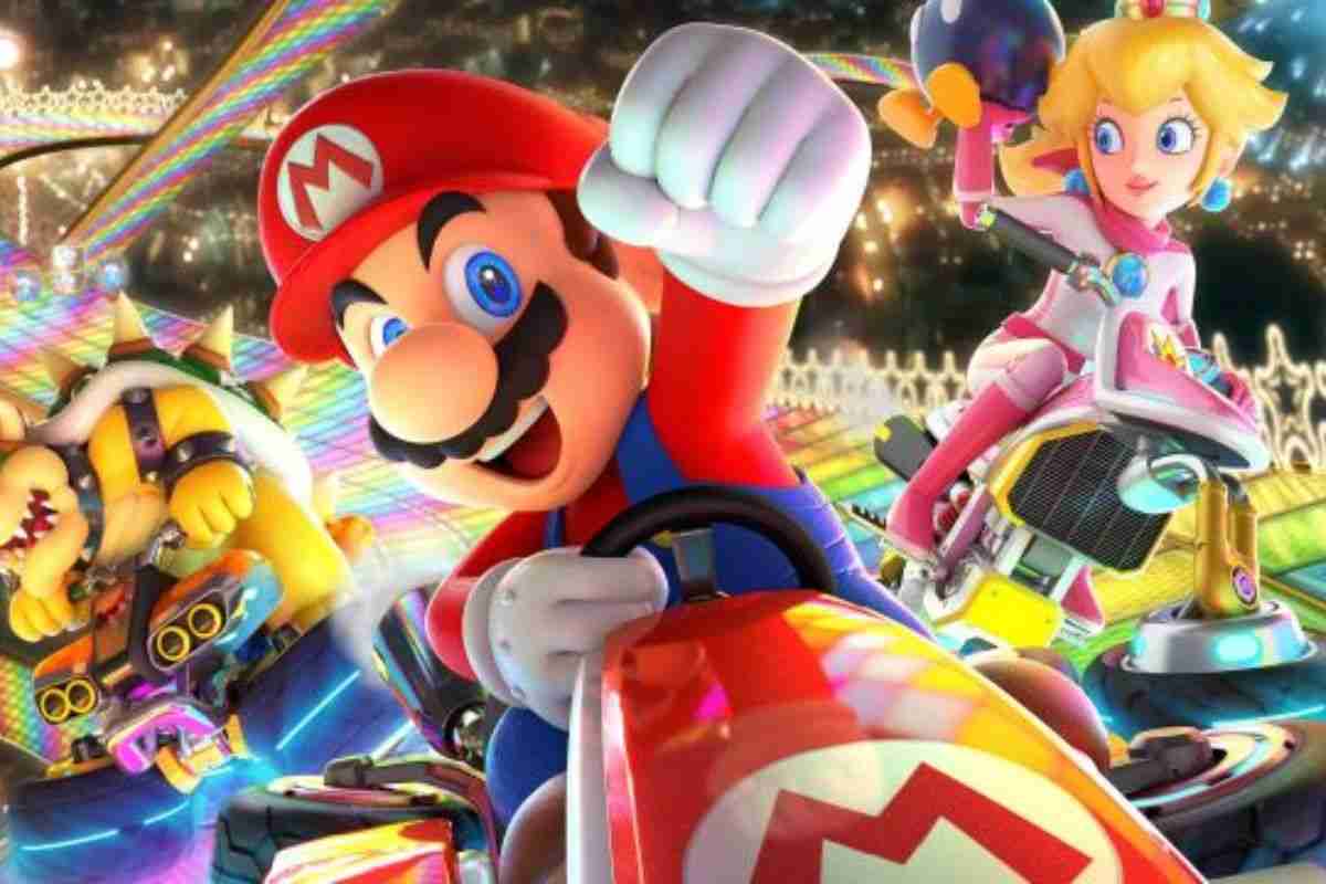 super mario sul kart con pugno alzato che festeggia