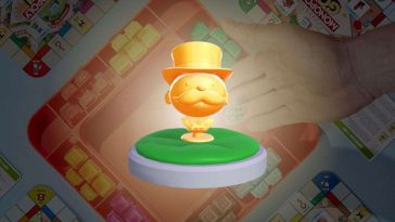 pedina mr monopoly dorato su sfondo del monopoly go