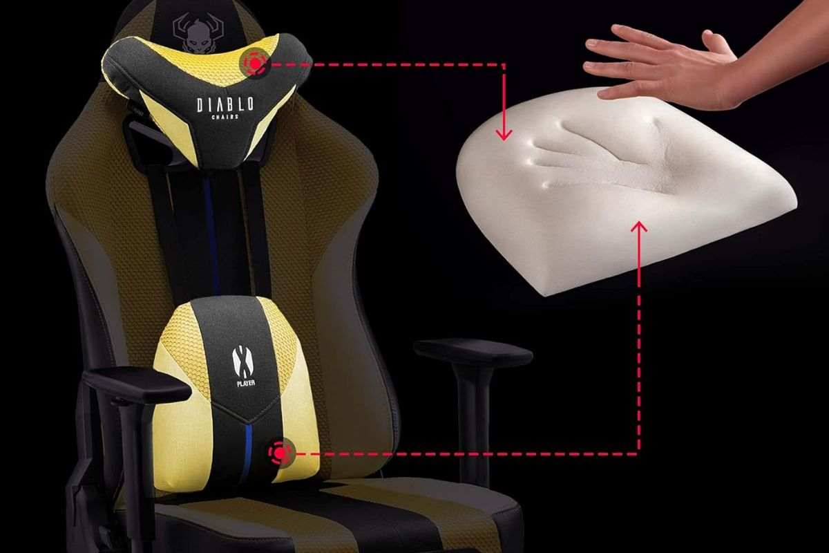 sedia DIABLO X-Player 2.0 con mano che schiaccia il cuscino