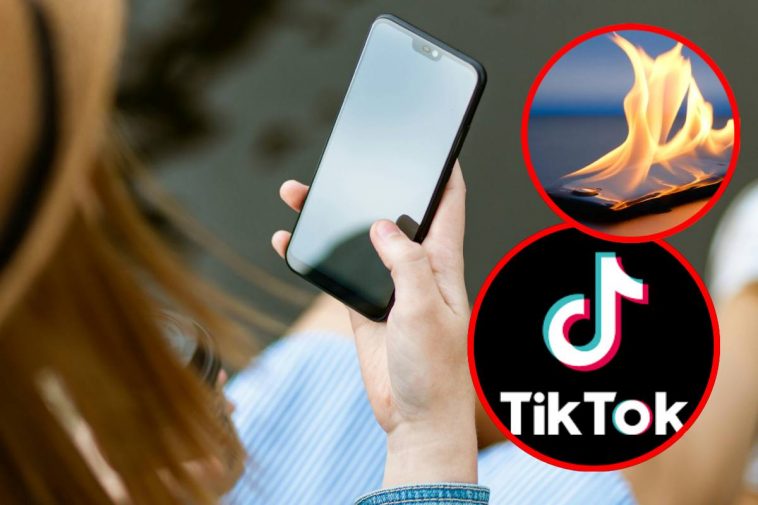 Una ragazza con un telefono in mano e, in evidenza, un telefono che brucia e il logo di TikTok
