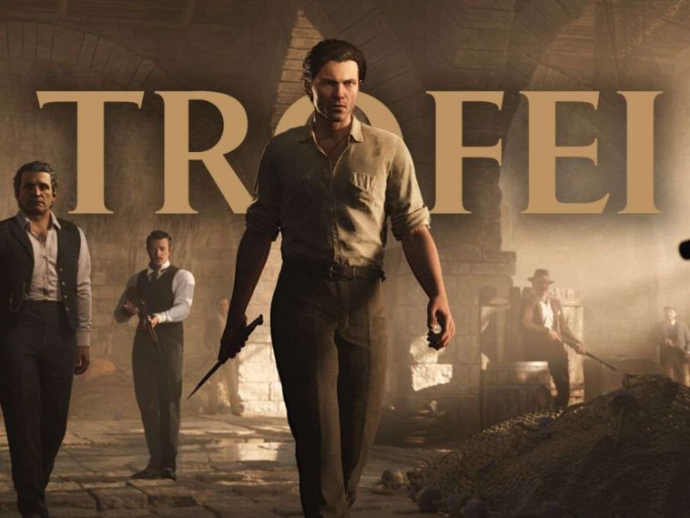 Mafia Terra Madre key art con scritta Trofei dietro Enzo