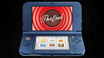 Nintendo 2DS XL aperto con scritta The End su sfondo nero