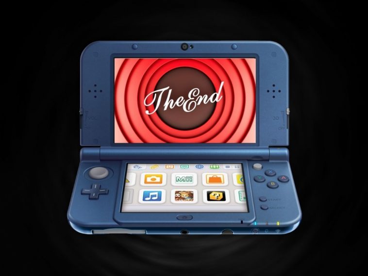 Nintendo 2DS XL aperto con scritta The End su sfondo nero
