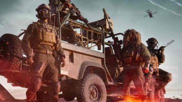 soldati in piedi e sedut su una camionetta, esplosione alle spalle