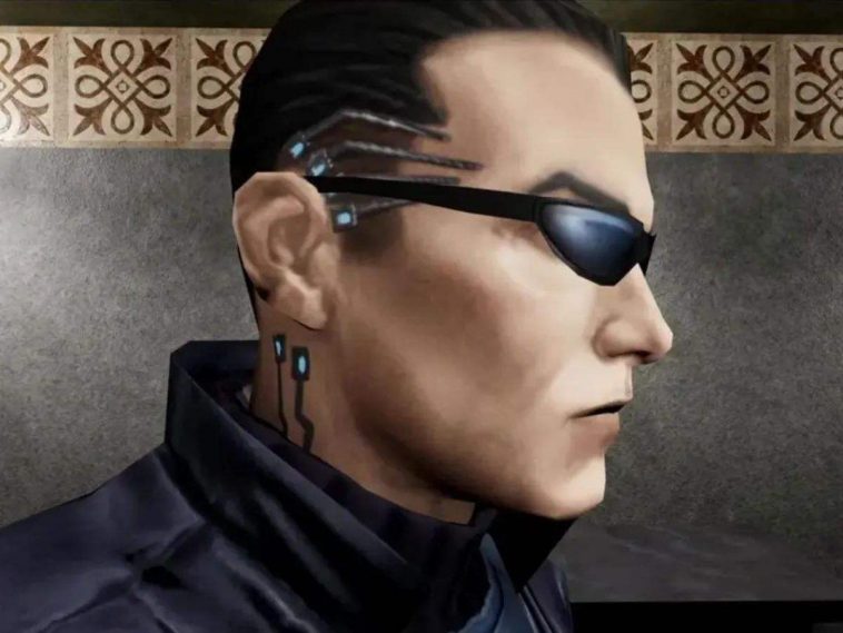 uomo con occhiali da sole e auricolare, di profilo