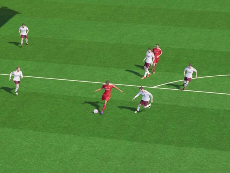 screenshot di una partita di football manager 26 con calciatore che sta tirando in porta