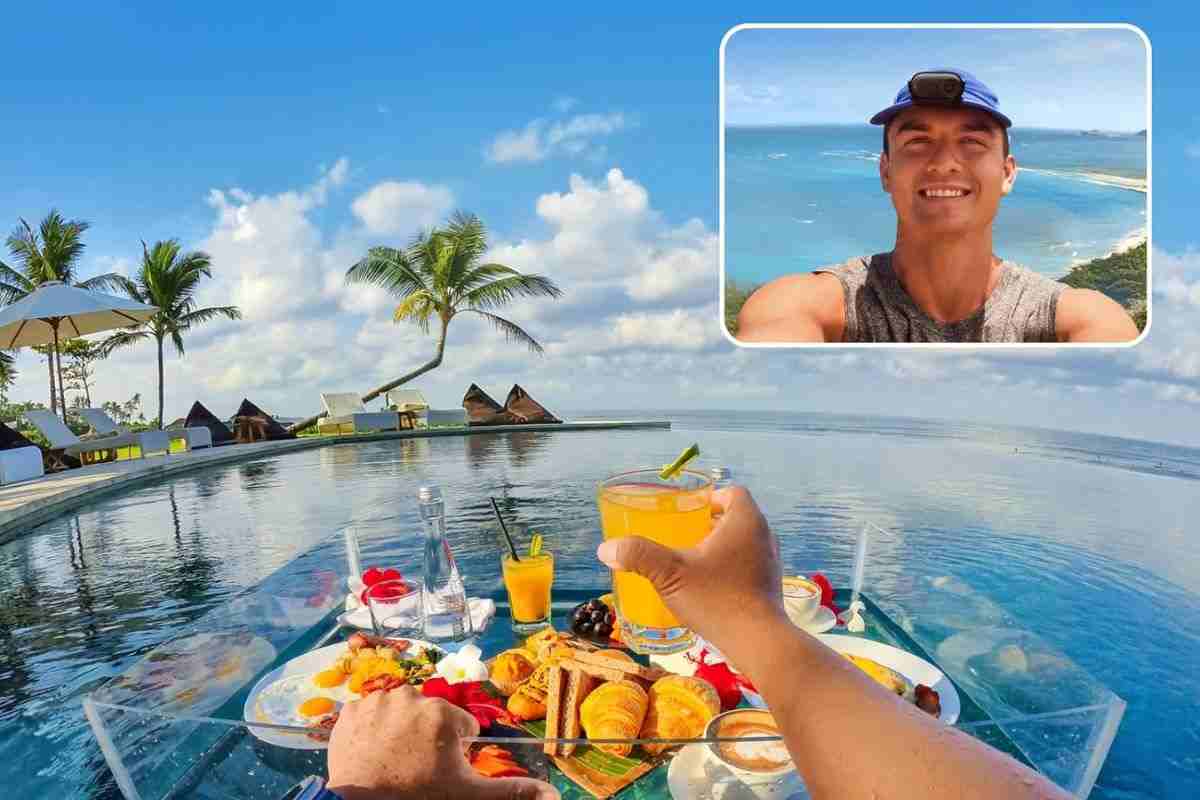 ragazzo seduto a bordo piscina con telecamera su cappellino, che riprende clazione con succo di frutta e frutta fresca