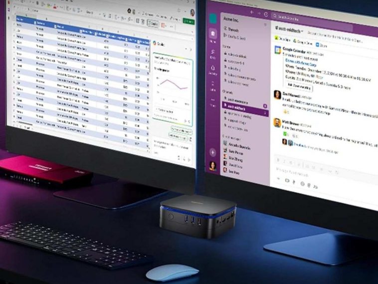 mini PC davanti a due schermi con tastiera e mouse