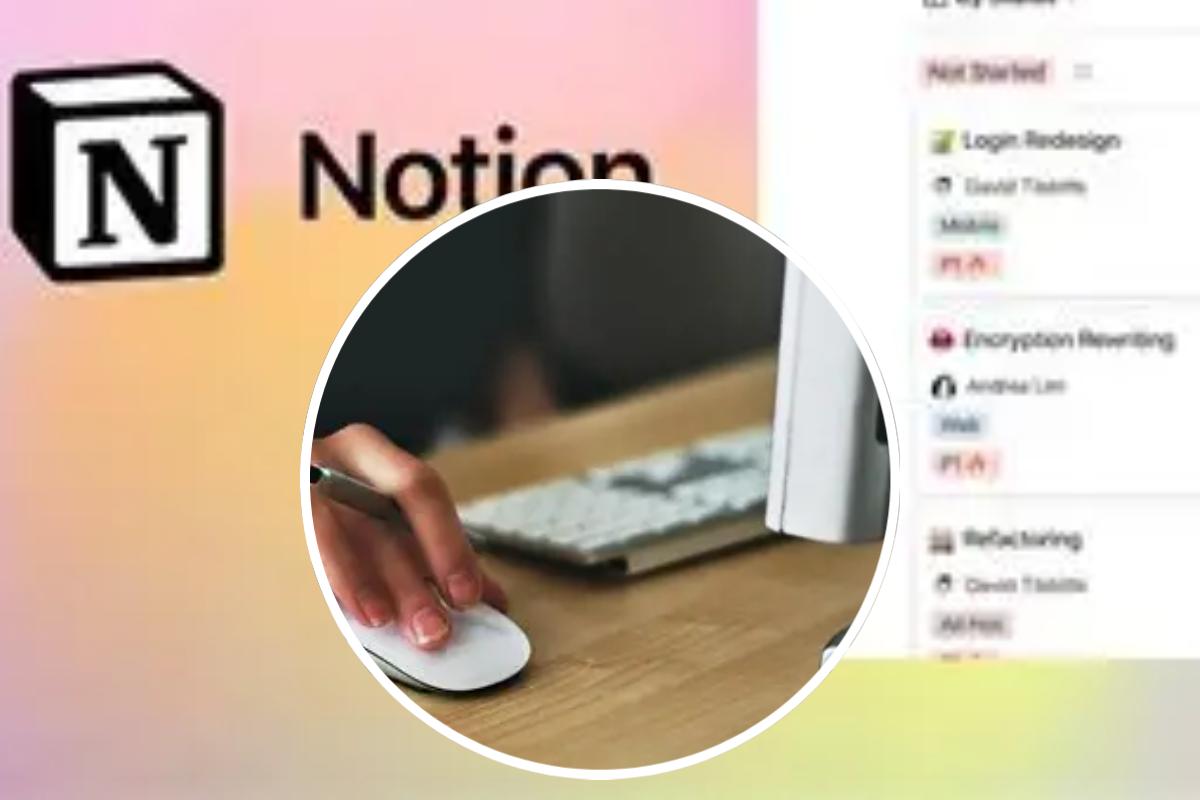 La pagina di apertura di notion.com e, in evidenza, una mano poggiata su un mouse
