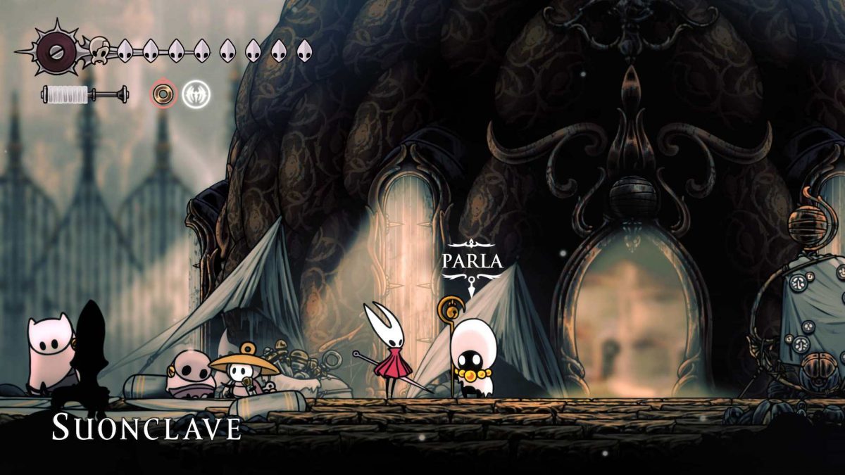 screenshot di silksong con hornet che parla con sacerdote a suonclave