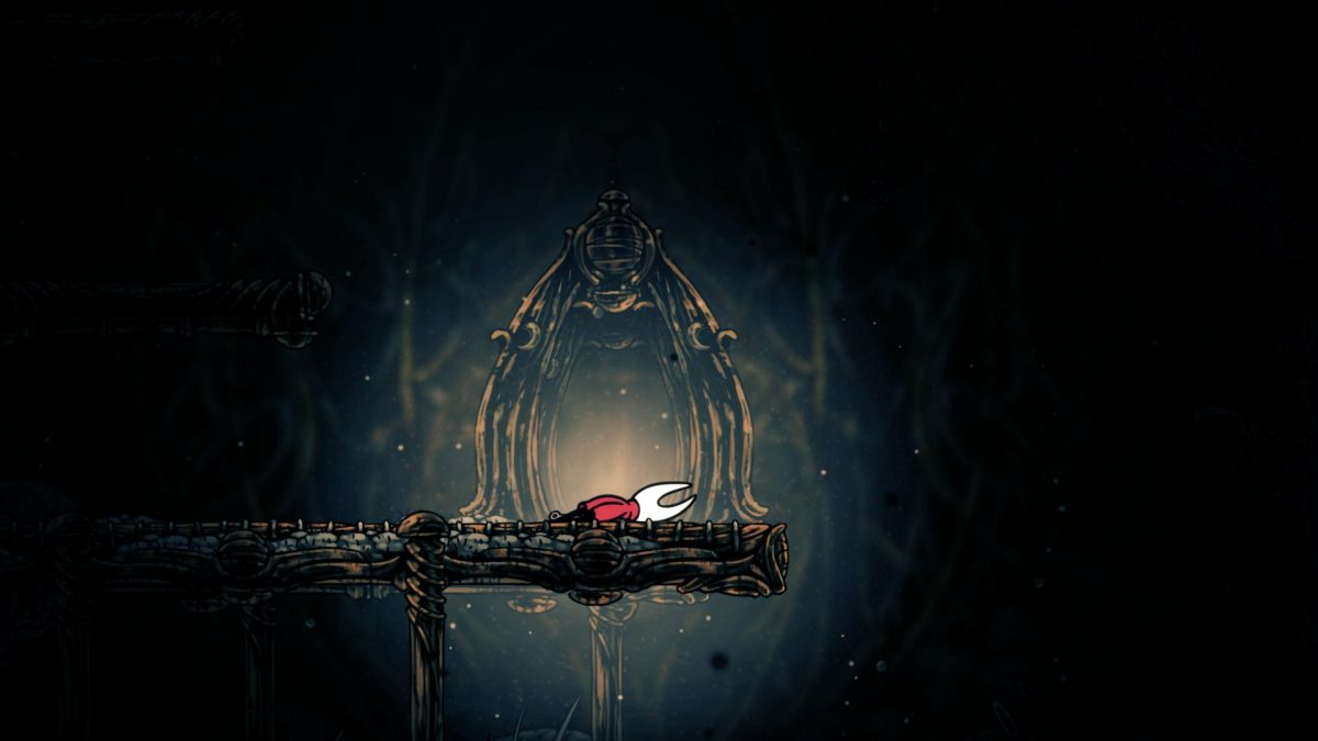 screenshot di hollow knight silksong con hornet a terra