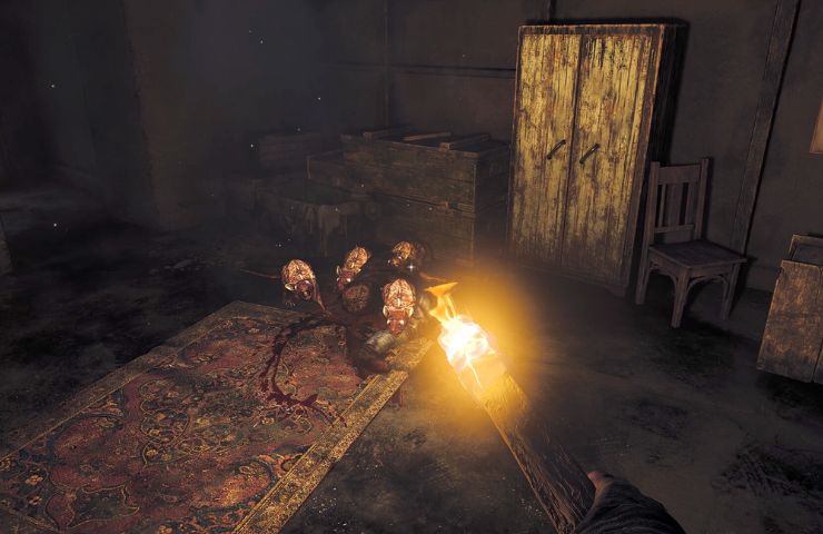 screenshot di amnesia the  bunker con mostro in primo piano che viene attaccato da una torcia