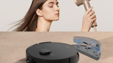 ragazza con asciugacapelli, robot aspirapolvere