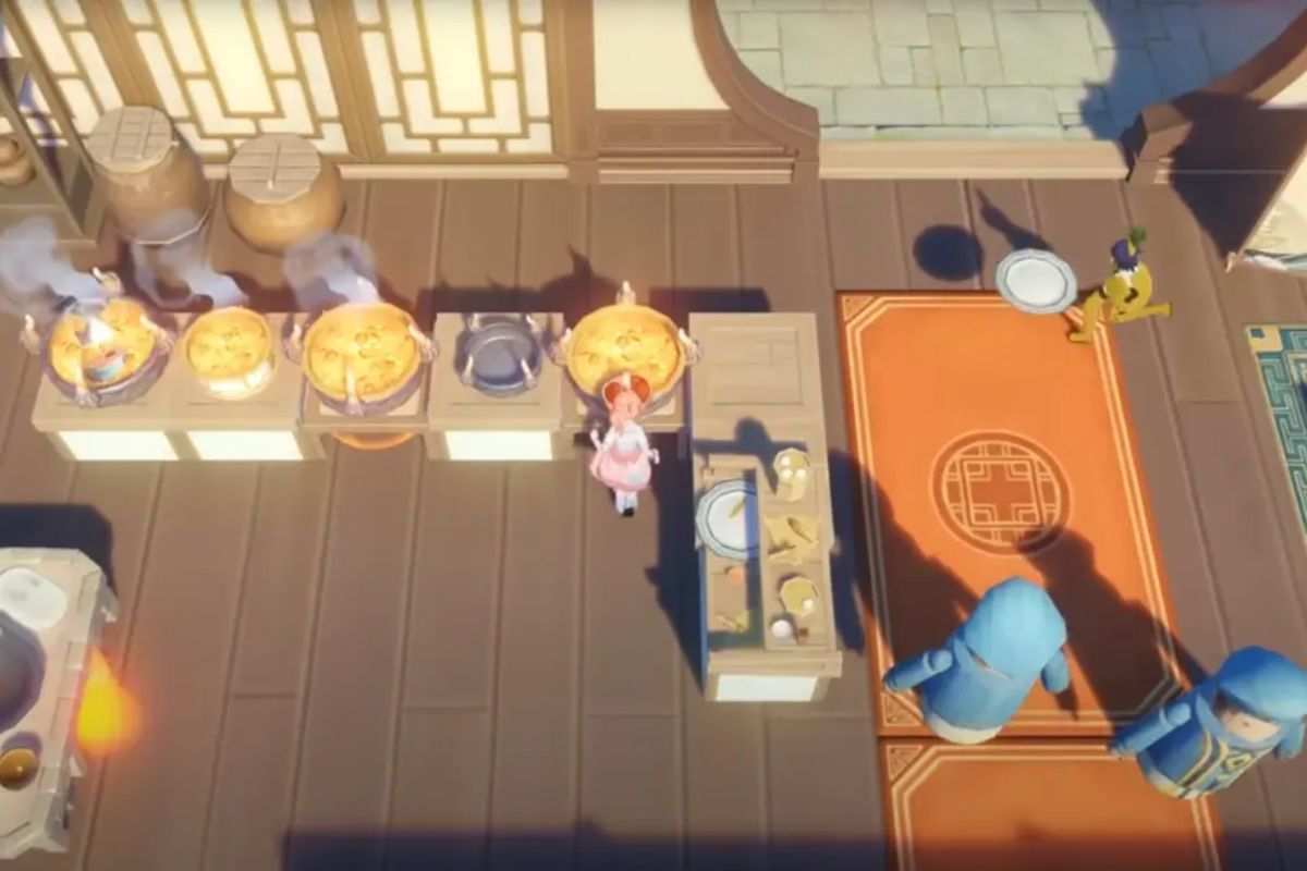 donna in cucina vista dall'alto