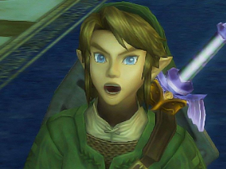 personaggio biondo con cappello e tuta verde a bocca aperta stupito