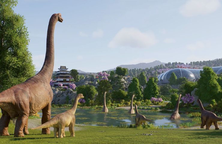 screenshot di jurassic world evolution 3 con dinosauri in un parco