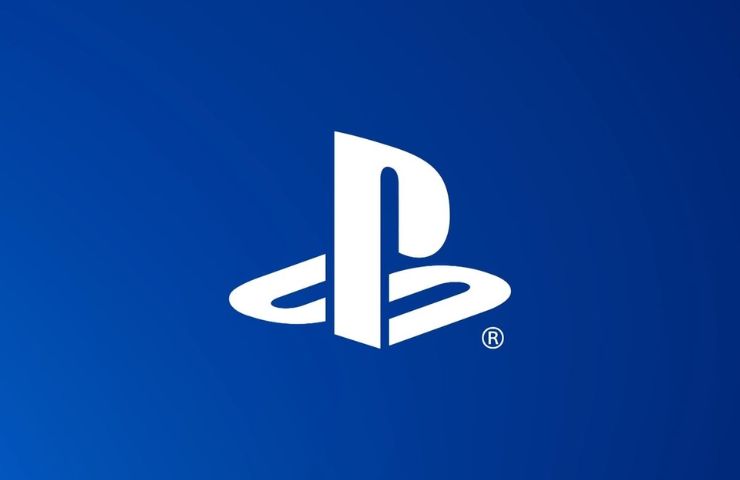 logo playstation su sfondo blu scuro