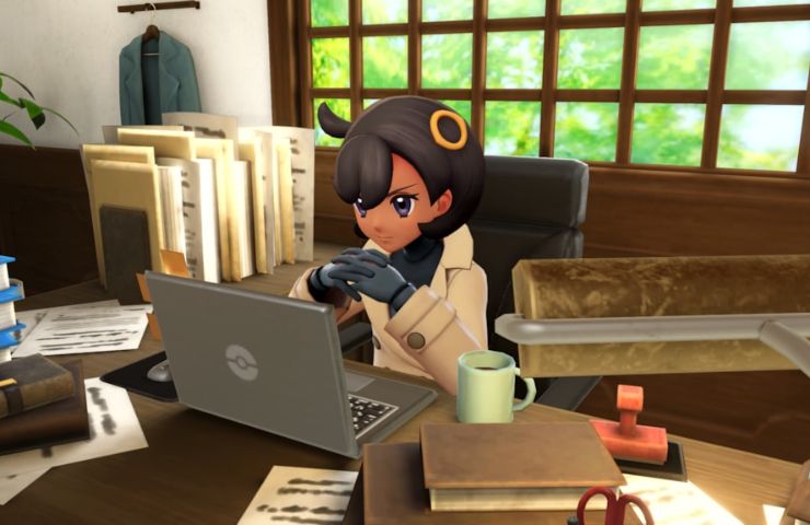 screenshot leggende pokemon z-a con matierre seduta alla scrivania