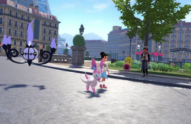 screenshot di leggende pokemon z-a con pokemon e umani per strada