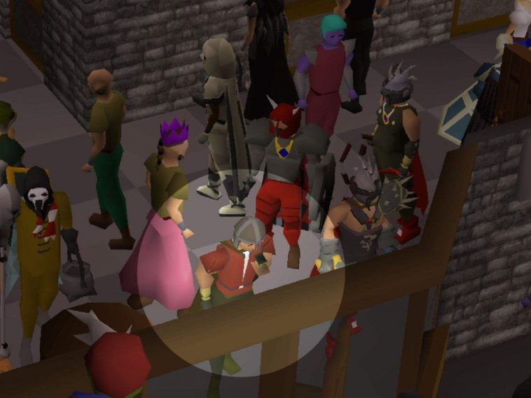 focus su persona nella folla che mangia trote, runescape