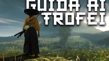 donna n abito giallo tipico giapponese medievale, cappello di paglia su prato, scritta guid ai trofei