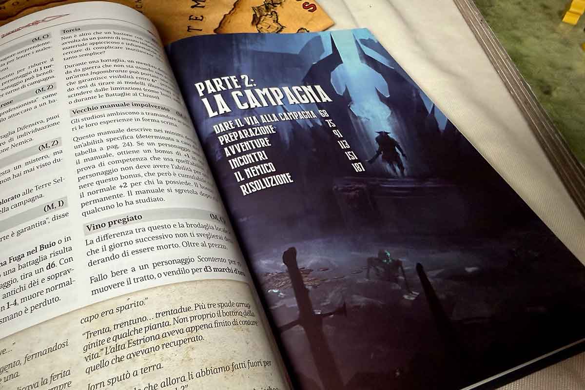 Le pagine del manuale aperte all'indice del capitolo sulla Campagna