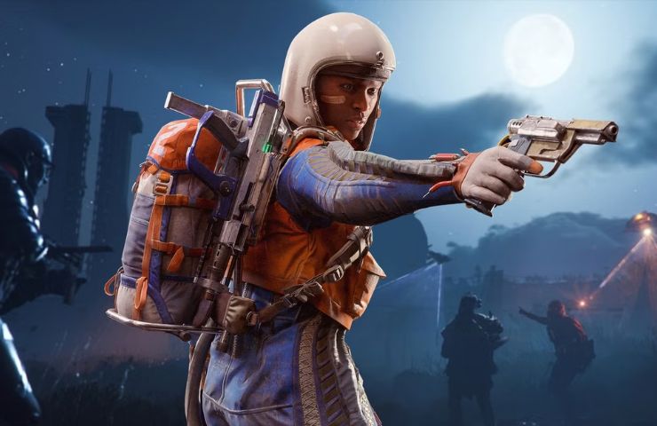 personaggio di ARC Raiders con una pistola in mano in primo piano