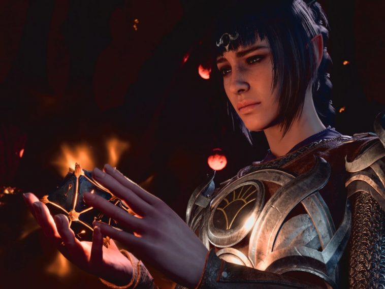 personaggio di baldur's gate 3 con una sfera magica fra le mani