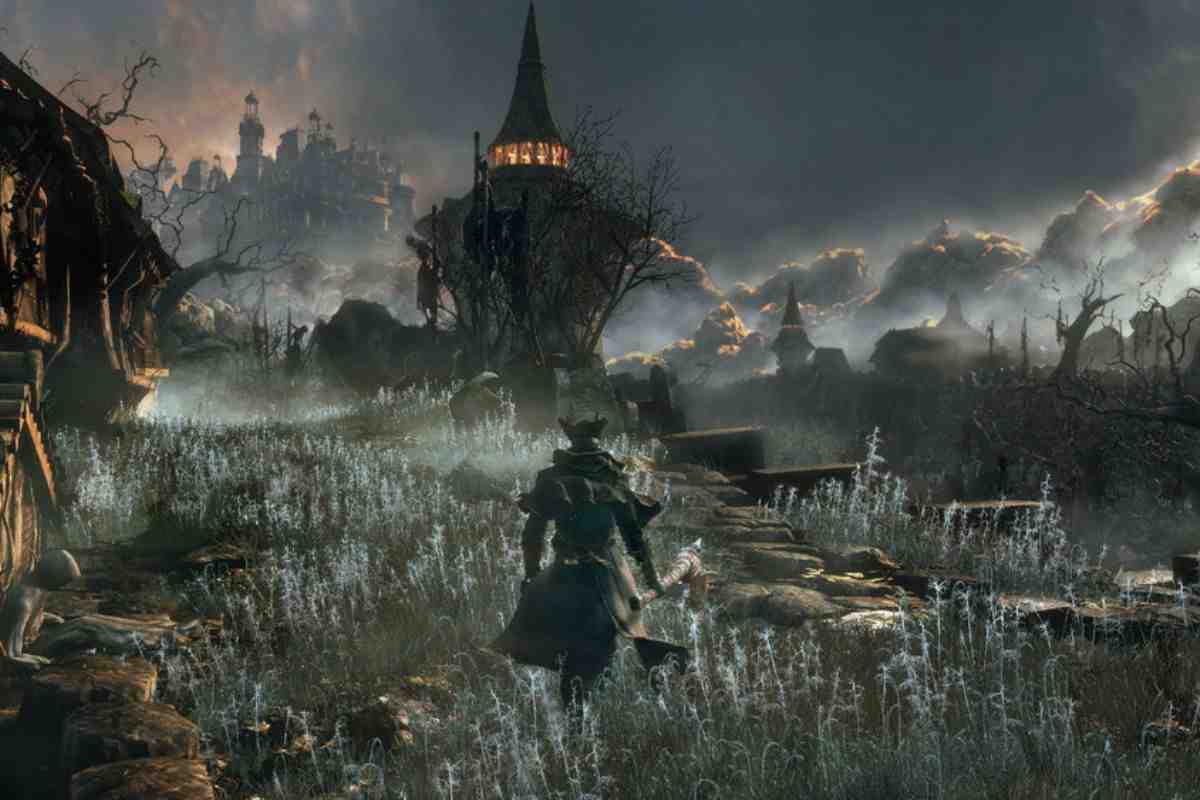 cacciatore di bloodborne con vestito nero e pistole che cammina verso torre illuminata