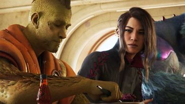 donna con capelli neri che guarda uomo con pelle verde che mangia