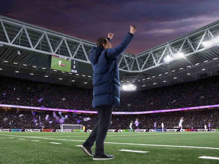 key art di football manager 26 con allenatore che esulta nello stadio