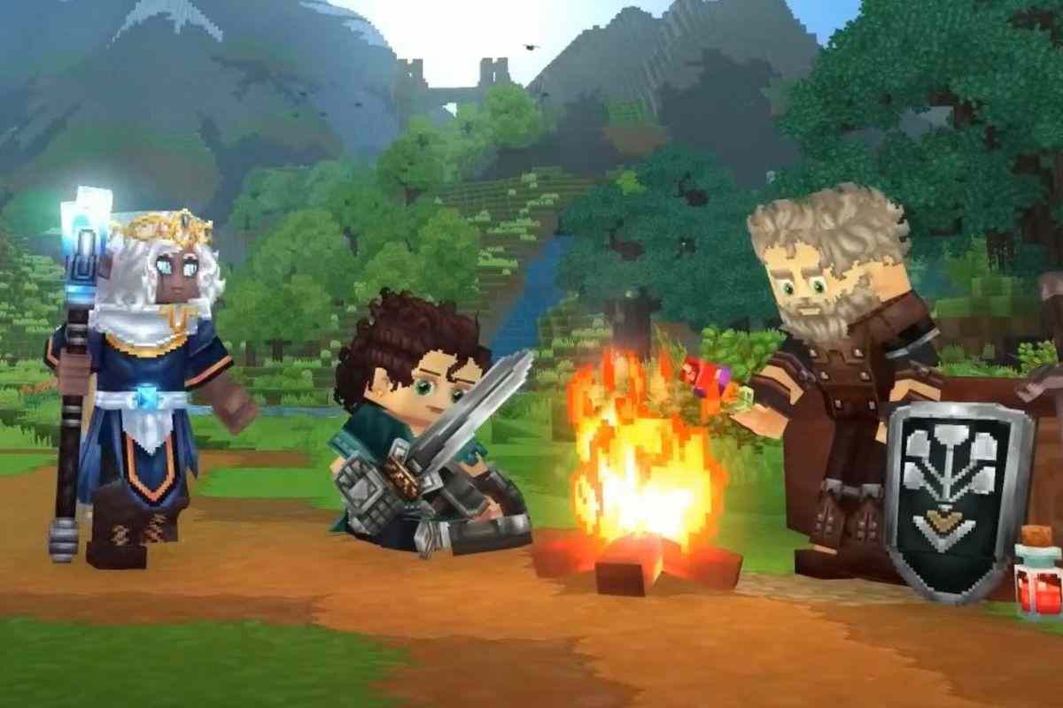 cavaliere con spada seduto al falò con uomo con barba e stregone